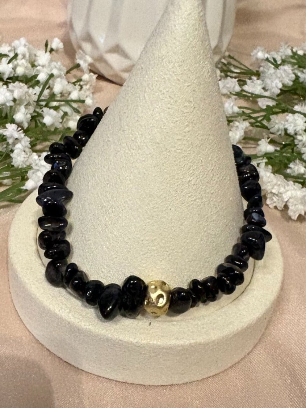 black beads and hammered gold accent bracelet